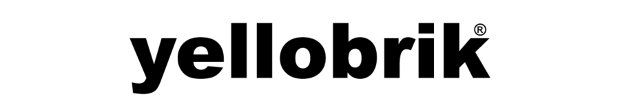 Black silhouette of a person jumping joyfully.