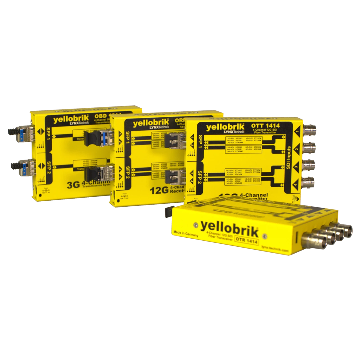 Yellow yelloBrik fiber optic modules arranged in a row, labeled 4-channel transmitter/receiver units for RF/optical transmission (OEM industrial gear).