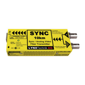 Yellow Lynx Technik 10 km fiber transmitter with warning labels and dual connectors on the right side