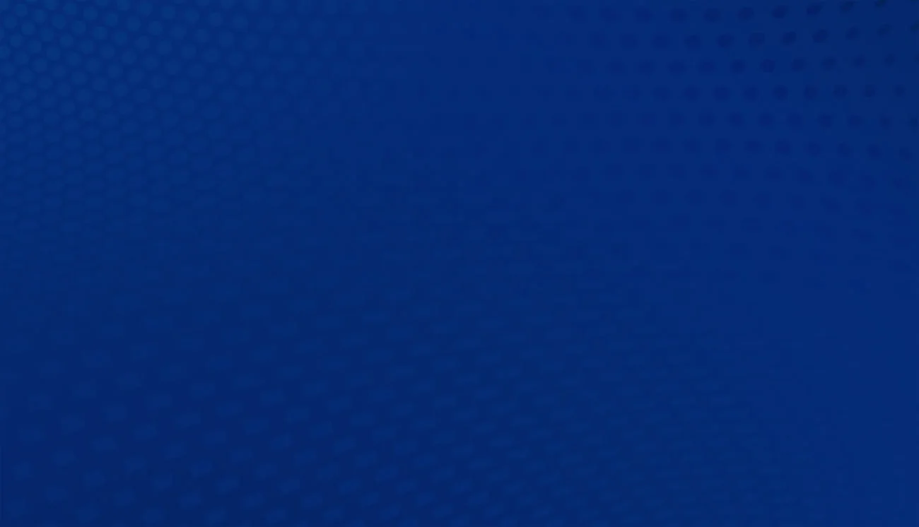 A textured blue surface with a subtle repeating pattern.